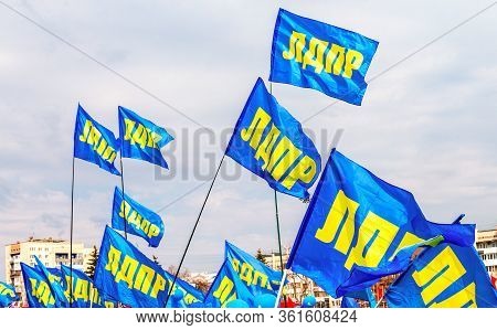 Samara, Russia - May 1, 2018: Flags Of Liberal Democratic Party Of Russia (ldpr) Against The Blue Sk