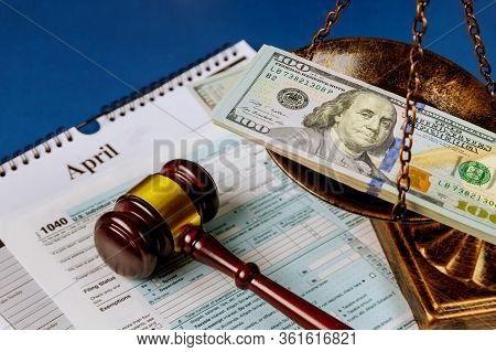 Law Concept Scales Of Justice Criminal Liability For Non-payment Of Taxes Of One Hundred Dollars Bil