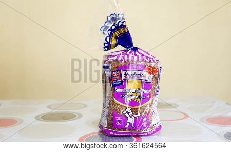 Sungai Buloh, Malaysia - April 13, 2020: The Purple Packaging Of Gardenia Bread Canadian Purple Whea