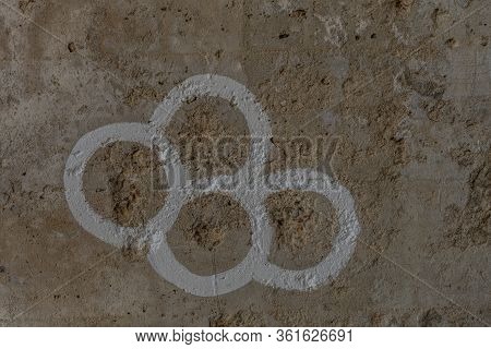 Closeup Of Bullet Holes In Concrete Wall Left From Korean War Marked With White Circles.