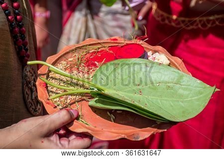 A Women Holding A Borondala (pooja Thali For Worshipping God) In Sindur Khela At A Puja Pandal On Th