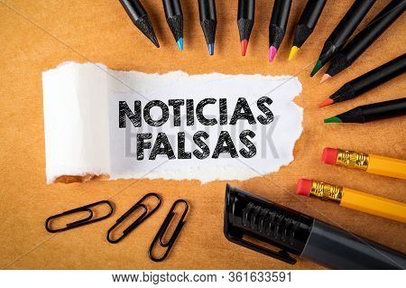 Noticias Falsas Means Fake News In Spanish. Panic, Money Fraud And Politics Concept