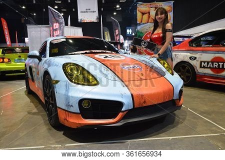 Pasay, Ph - July 28: Alx Autosports Female Model With Porsche Sports Car At Bumper To Bumper Prime C