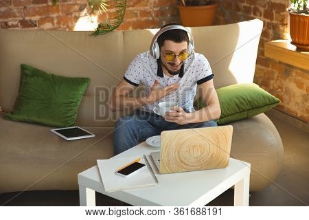 Remote Meeting. Man Working From Home During Coronavirus Or Covid-19 Quarantine, Remote Office Conce