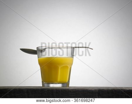 cup of mango puddding on white background ready to eat