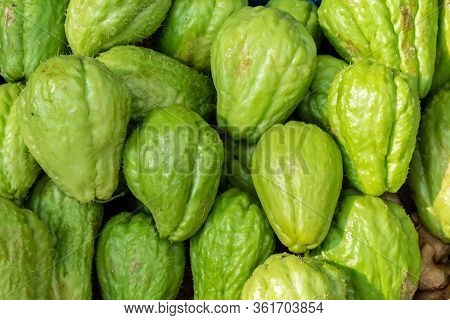 Freah Chayote Or Sechium Edule On Market For Sale.freah Chayote Background.is A Very Useful Vegetabl