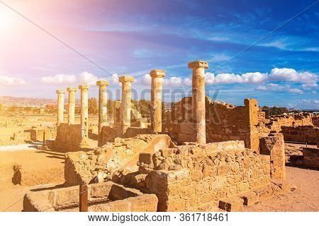 Ancient Ruins Of Kourion City Near Pathos And Limassol, Cyprus. Row Of Columns Under Blue Sky. Trave