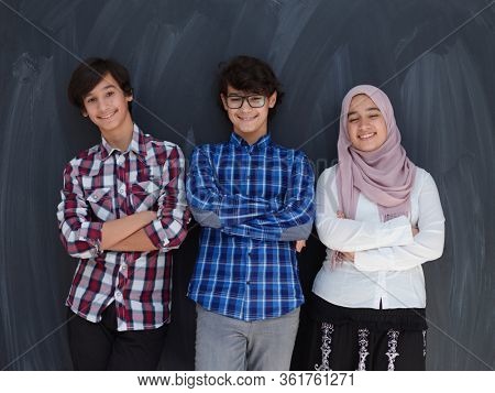 teens portrait arab family , ,iddle eastern students team against black chalkboard