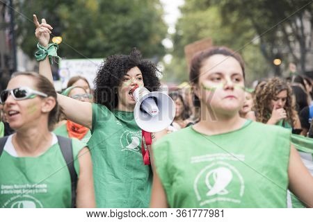 Caba, Buenos Aires / Argentina; March 9, 2020: International Womens Day. Young Woman With A Megaphon