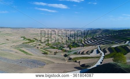 Aerial View Of Terraced Farm Field Mass Production During Summer Dry Season In Tianshui, Gansu Provi