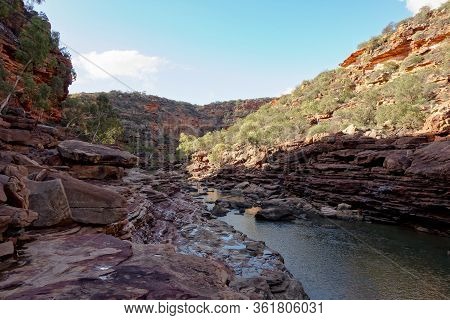 The Rocks And Cliffs Above Murchison River Under In Z-bend In Western Australia In Late Afteroon Wit