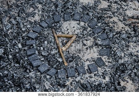 Norse Rune Thurisaz On Ashes Backgorund Inside The Circle Of 24 Norse Runes