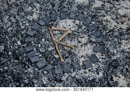 Norse Rune Raidho On Ashes Backgorund Inside The Circle Of 24 Norse Runes
