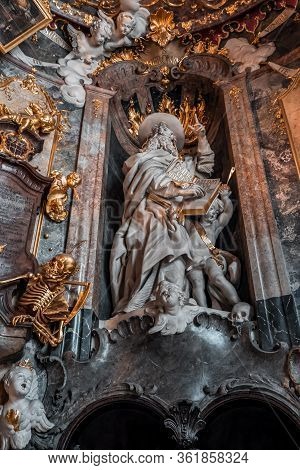 Feb 2, 2020 - Munich, Germany: St Jerome Hieronymus Statue In Entrance Hall To Baroque Church Asamki