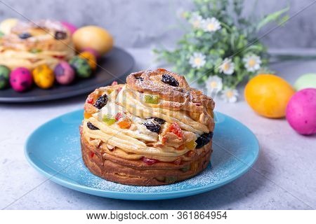 Craffin (cruffin) With Raisins, Nuts And Candied Fruits. Easter Bread Kulich And Painted Eggs. Easte