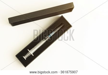 Syringe Closeup Isolated On White Background On A Light Background