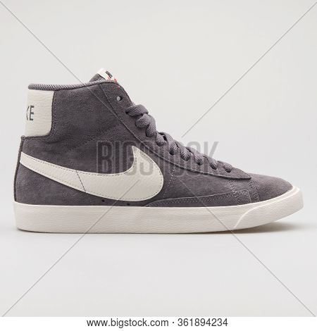 Vienna, Austria - August 29, 2017: Nike Blazer 77 Suede Grey And White Sneaker On White Background.