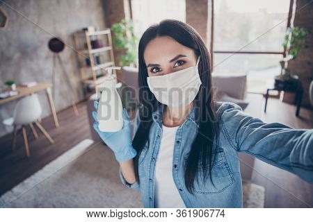 Closeup Photo Of Responsible Citizen Lady Stay Home Quarantine Using Anti Virus Mask Spray Antisepti
