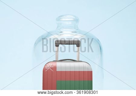 Suitcase With Omanian Flag Design In Quarantine Minimal Creative Coronavirus Travel Restriction Conc