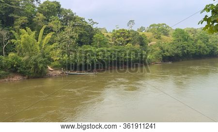 La Hormiga, Putumayo / Colombia - March 8 2020: People Of The Ecuador-colombia Border Embarking Boat