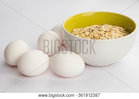 White Chicken Eggs On A White Background