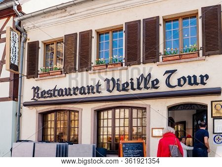 Selestat, France - Apr 15, 2019: People Entering Restaurant Vieille Tour In Central Of Selestat To L