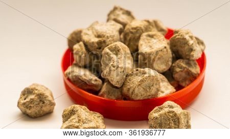 Pile Of Raw Asam Boi Or Sour Plum On Red Bowl On White Background.