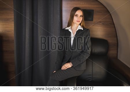 Attractive Woman In Private Jet