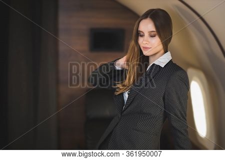 Attractive Woman In Private Jet