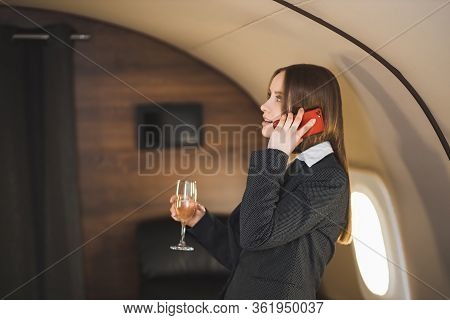 Attractive Woman In Private Jet