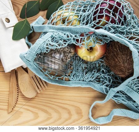 Net Bag With Reusable  Glass Jars, Fruits And Bamboo Cutlery. Zero Waste Concept. Eco Friendly. Flat