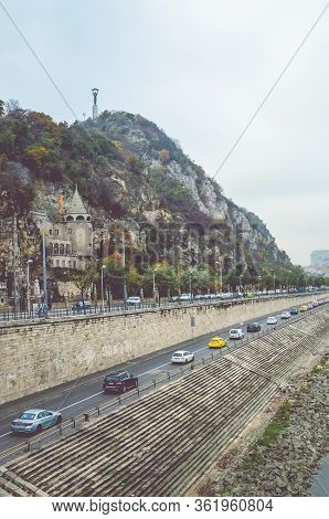 Budapest, Hungary - Nov 6, 2019: Gellert Hill Cave Church, Sziklatemplom. Liberty Statue On The Top 