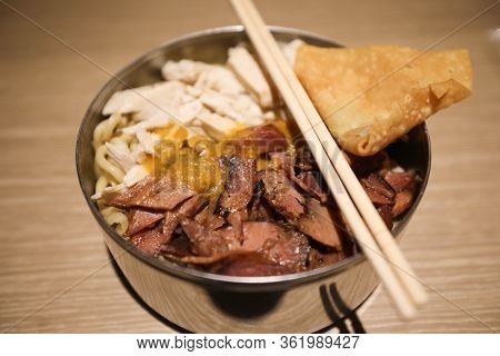Closeup Image Of Indonesian Food, Meat Noodles, Bakmi, Served On A Bowl With Chopstick