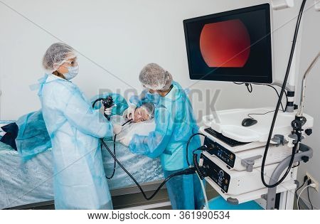 Endoscopy At The Hospital. Doctor Holding Endoscope Before Gastroscopy