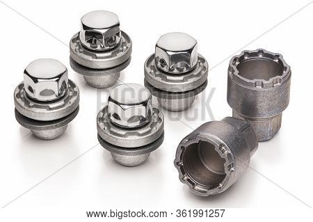 Car Lock Nuts, Wheel Nut That Protect The Wheels From Theft. Close-up Of The Isolate On A White Back