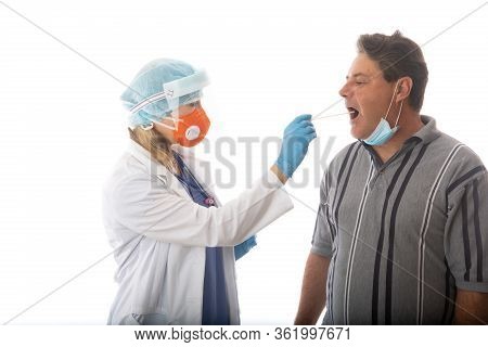 A Female Healthcare Worker Swabbing A Patient For Respiratory Viruses Covid-19  Or Flu