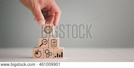 Business Strategy, Action Plan, Goal And Target, Hand Stack Woods Block Step On Table With Icon Abou