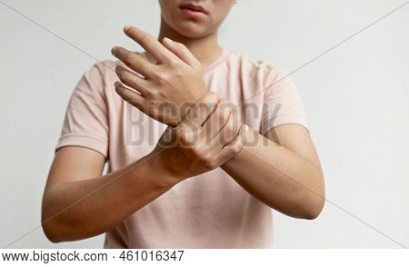 Woman Hand Massage Physiotherapy Wrist Is Sore And Numb, Exhausted, Tingling. Guillain-barre Syndrom