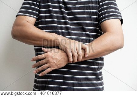 Man Hand Massage Physiotherapy Wrist Is Sore And Numb, Exhausted, Tingling. Guillain-barre Syndrome,