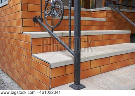Stairs With Clinker Tiles,external Stairs Made Of Clinker Stone And Wrought Iron Railings