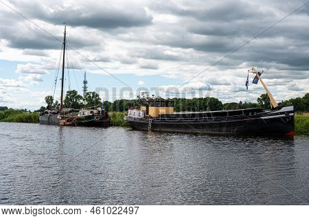 Haerst, Overijssel, The Netherlands, 07 25 2022 - Transportation Vessels And Green Surroundings Of T