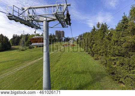View Of Chairlift To The Mountain With Observation Tower Located At The Top Of The Słotwiny Arena Sk