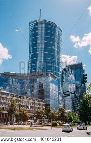 Warsaw, Poland - June 27, 2022: Neomodern Architecture. Business Center. Downtown City. Street Road 