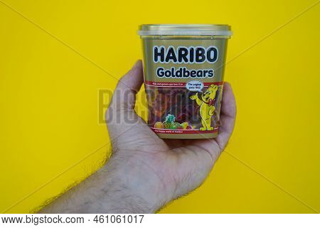 Pskov, Rusia - August 09, 2022: A Man Keeps Up To Date With A Pack Of Haribo Chewing Bears On A Yell