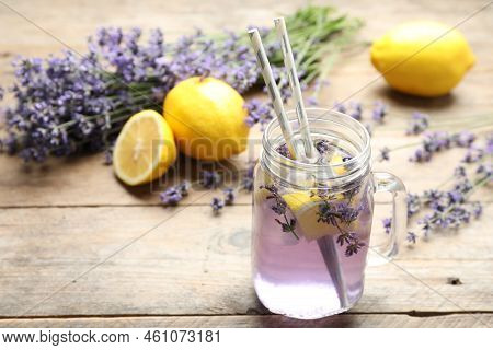 Fresh Delicious Lemonade With Lavender In Masson Jar On Wooden Table. Space For Text