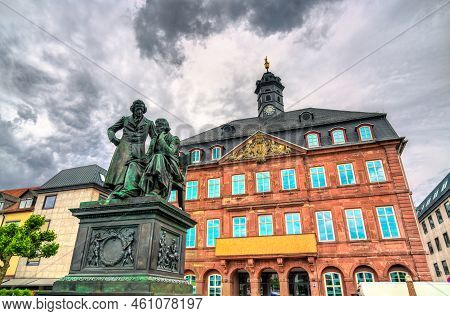 Monument To The Brothers Grimm And The Town Hall In Hanau, Hesse, Germany