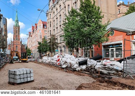 Latvia, Riga, August, 2022: Repair Of The Road Of The Gertrudes Street On Background Of Saint Gertru