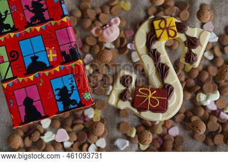 Dutch Sinterklaas Tradition:a Chocolate Letter, A Present And Candy Called Pepernoten.