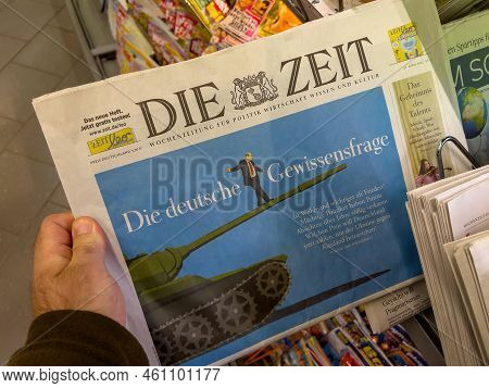 Berlin, Germany - Apr 23, 2022: The German Question Of Moral Issue Headline Depicting Illustration O