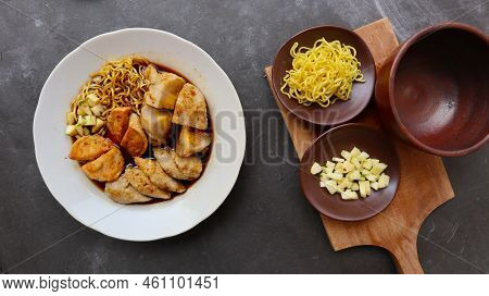 Pempek Or Empek-empek Or Fish Cake Is A Food Made From Soft Ground Fish Meat Mixed With Tapioca Flou
